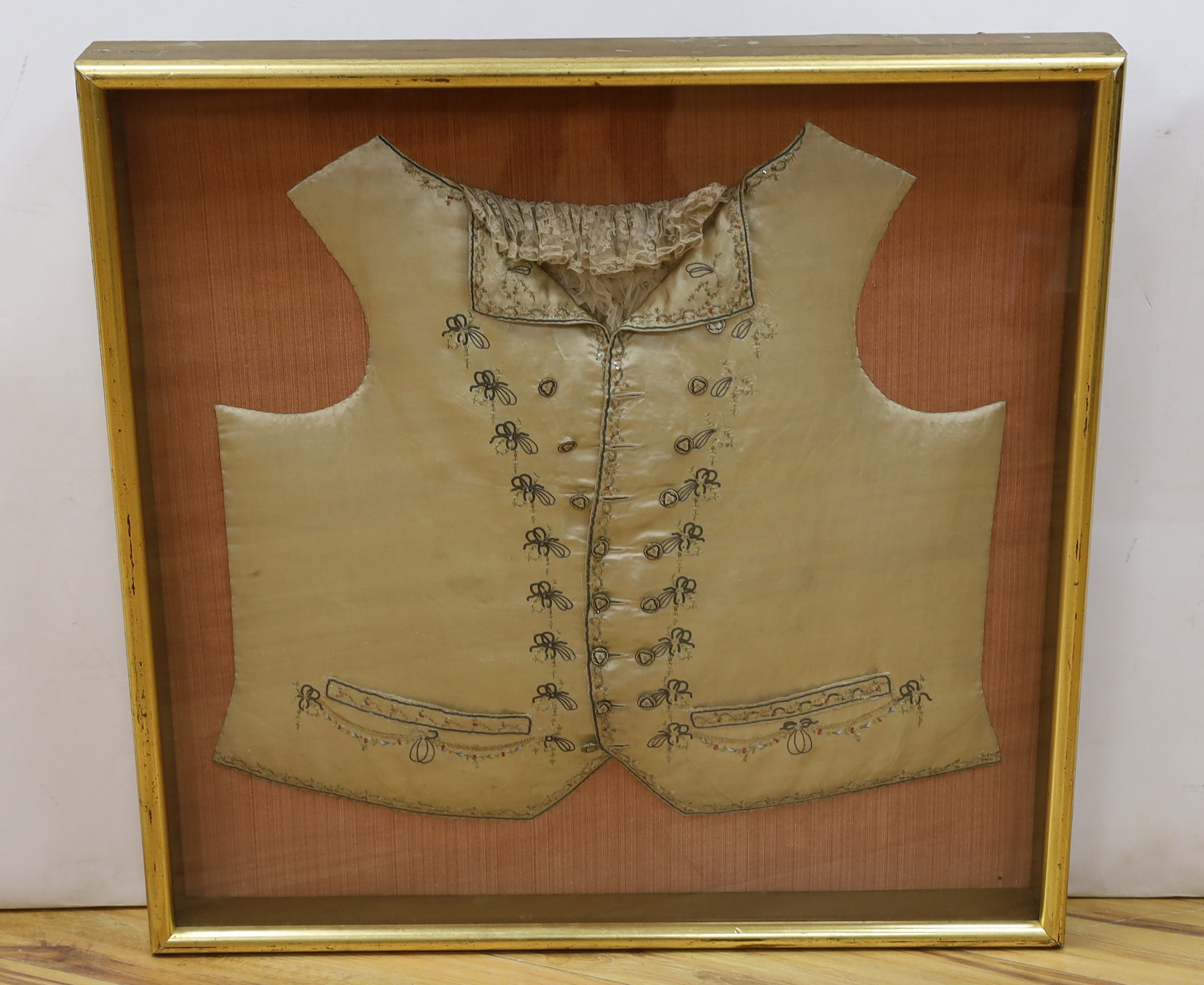 A George III silk embroidered waistcoat, reputedly once belonging to John Wilkes (1725-1797) framed and glazed
